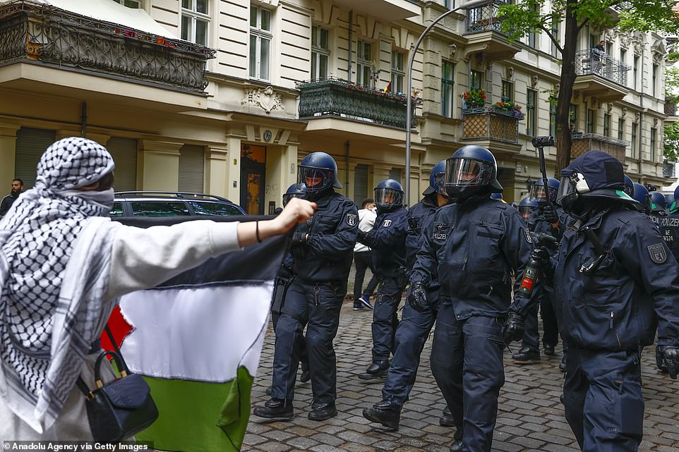 BERLIN: Police officers intervene in demonstrators as people gather to stage a demonstration in support of Palestinians and to protest against Israeli attacks on Gaza Strip, on May 15, 2021 in Berlin