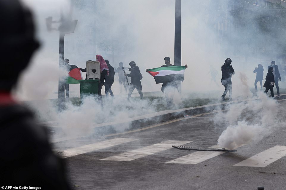 PARIS: Smoke fills the air during a pro-Palestinian rally called against Israel's bombardment of the Palestinian Gaza Strip, in Paris on May 15, 2021