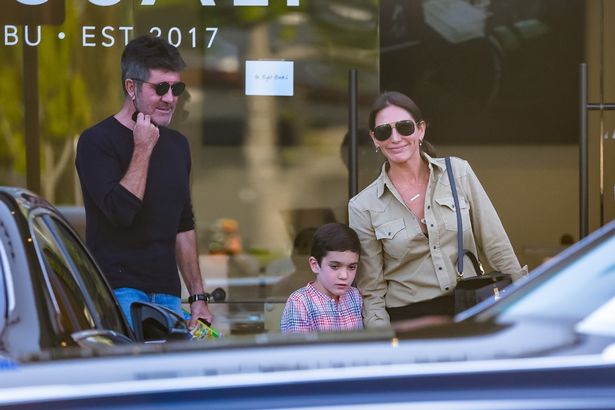 Simon Cowell was spotted with son Eric and partner Lauren