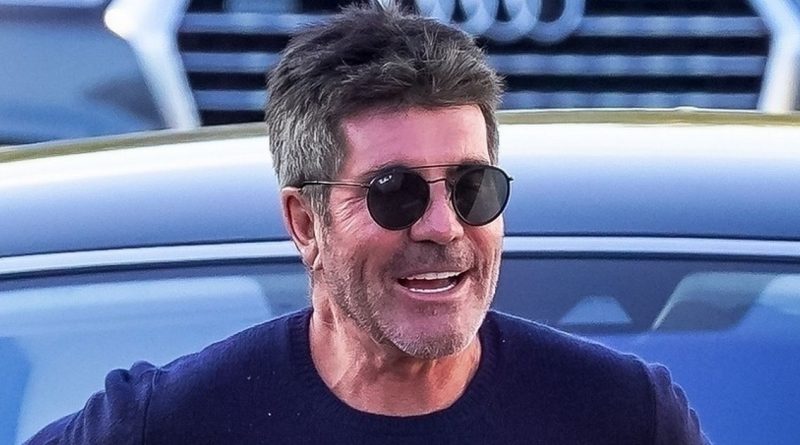 Simon Cowell is picture of health less than a year after nearly being paralysed