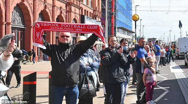 Scores of people turned out for the event held in his memory, with many holding aloft Liverpool scarves