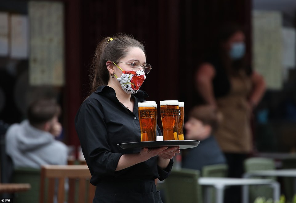 Drinkers in Edinburgh enjoyed an early breakfast of three pints of lager as restrictions were eased in Scotland