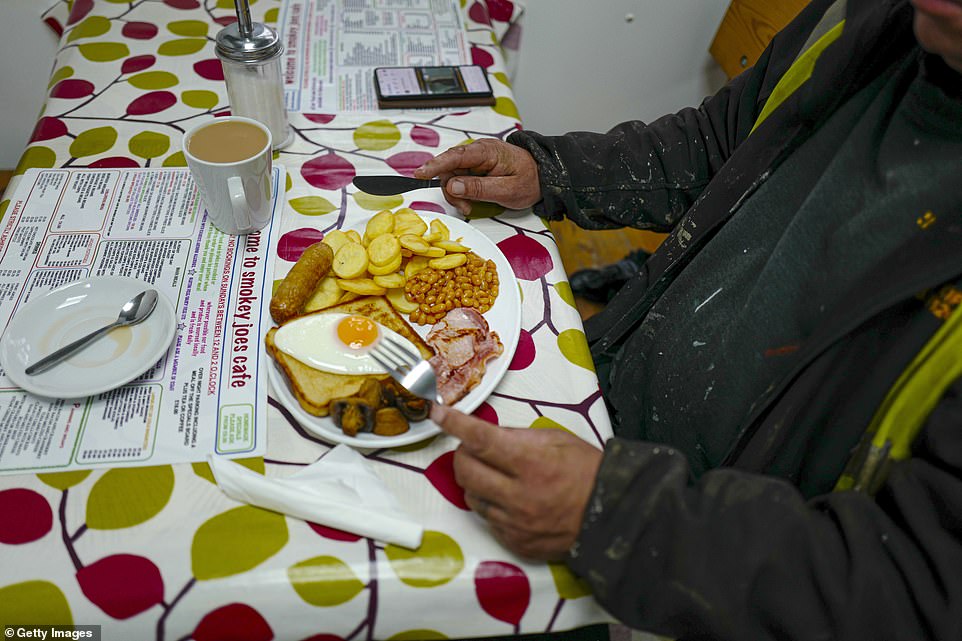 A customer about to start his Full English at Smokey Joe's Cafe in Falmouth, where he was dining inside