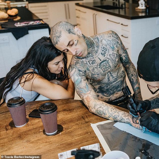 Making it permanent: Travis is now with Kourtney Kardashian and the couple have been showing off their romance on social media