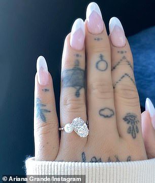 Bling ring: The couple got engaged in December (Grande's sparkler pictured)