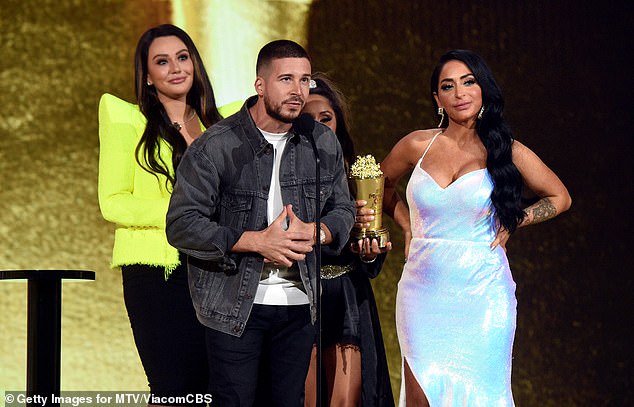 The Fam: Vinny Guadagnino joined Nicole 'Snooki' Polizzi, Jenni 'JWoww' Farley and Angelina Pivarnick. 'Thirteen years ago, we were just a bunch of kids on the boardwalk, just partying. We had no idea it was going to change our life forever