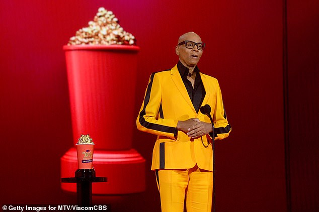 Icon: RuPaul won for RuPaul's Drag Race. He said he learned how to host by following Cher's example. 'So, Cher, why don't you snap out of it and come do our show, man?' he joked