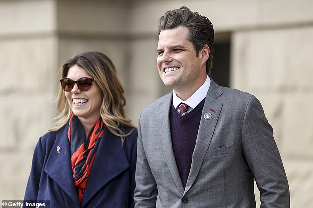 Rep. Matt Gaetz (R-FL) walks with his fiancee Ginger Luckey in January. Investigators are seeking to determine whether Gaetz had sex with the same 17-year-old Greenberg was accused of trafficking