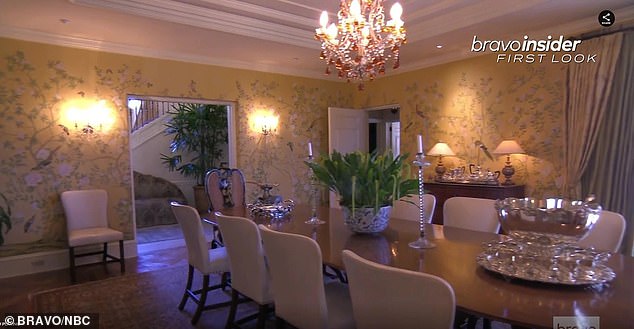 Lavish: One of the dining rooms is also seen in the footage, showing luxurious décor and an ornate chandelier