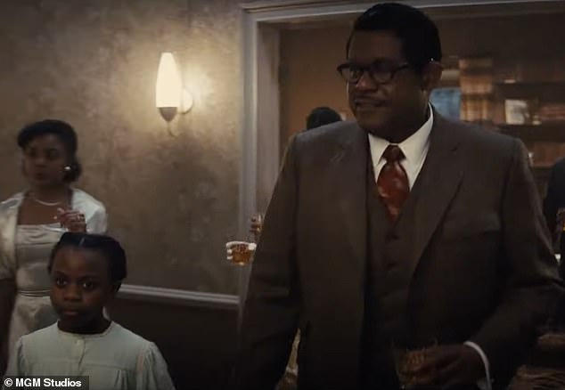 There he is: Her father C.L. Franklin, a civil rights activist and Baptist minister portrayed by Oscar winner Forest Whitaker, is glimpsed walking little Aretha into a party