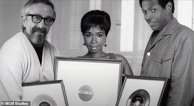 Dynamic trio: Stardom comes instantly with Aretha hounded by photographers and posing with music industry titan Jerry Wexler (Marc Maron, left)