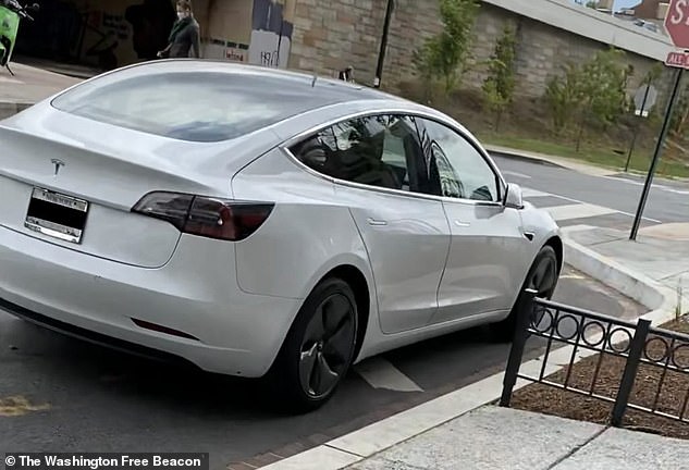 The $35,000 Tesla with New York plates and a Congressional parking pass was pictured in a no-parking zone near AOC's luxury DC apartment on May 14