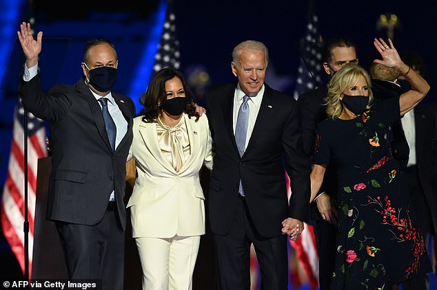 Nearly a year later, when Biden became the Democratic nominee, he chose Harris as his running mate and she soon thereafter became the first minority woman to hold the office of vice president. The first and second couples appear here on November 7, 2020 – shortly after winning the election