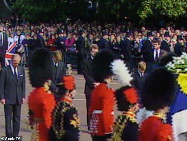 Footage shown in the clip shows William (second left) and Harry (right) as they  grieved for their mother Diana