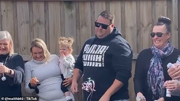 Moment expecting father throws balloon down in disappointment after gender reveal shows girl on way