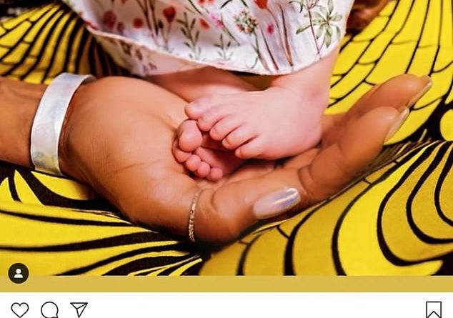 Naomi Campbell, 50, announces she is a mother as she shares picture cradling a newborn