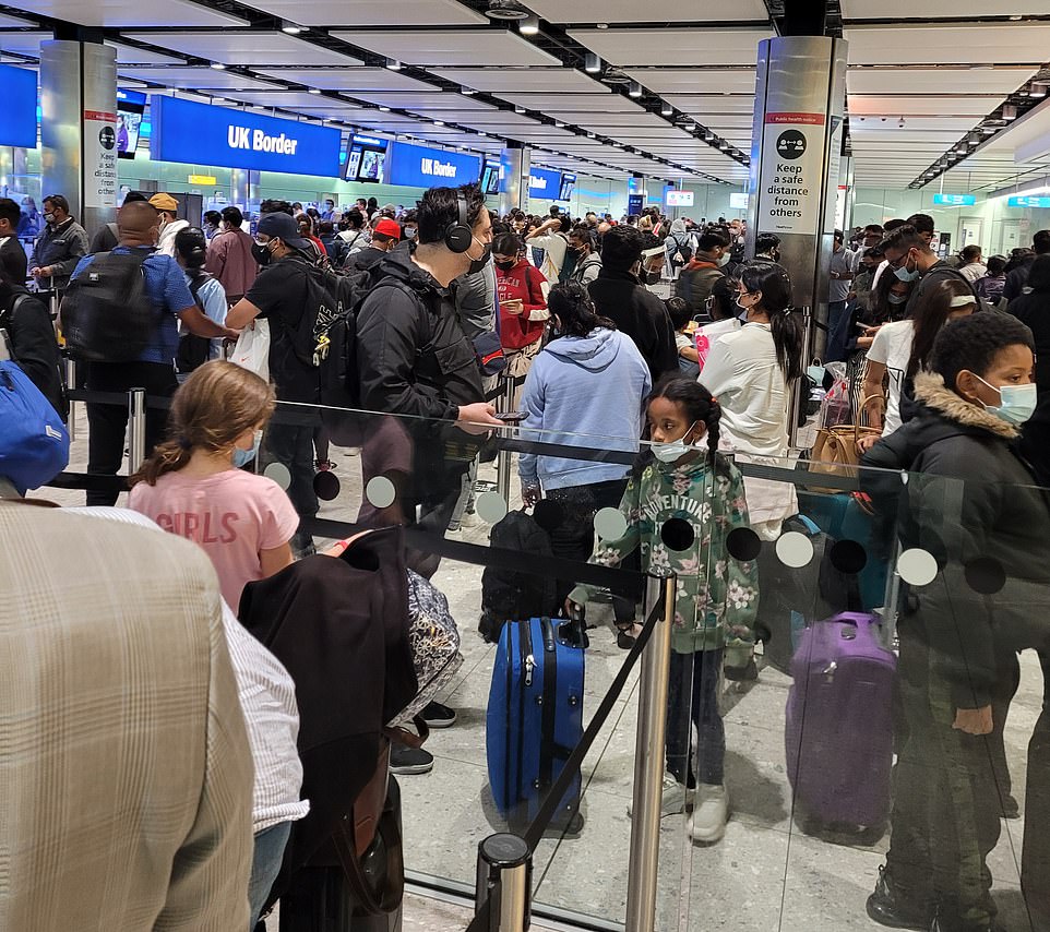 Passengers flying into the UK today faced 'bedlam' at the borders with some facing a three hour wait. Pictured: One arrival sent this picture in of the queues at Heathrow today
