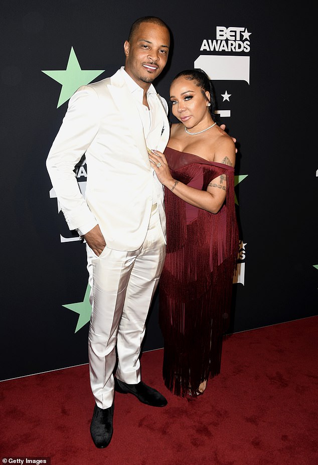 Speaking up: Rapper T.I. addresses sexual assault allegations against him and his wife Tiny Harris (born Tameka Cottle) in his newest track, called What It's Come To, on Thursday; seen in 2019