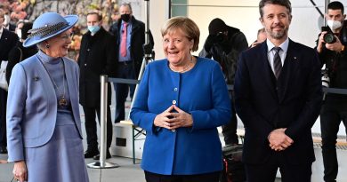“Love Of Symmetry”: How Angela Merkel’s Rhombus Hand Gesture Became A Brand